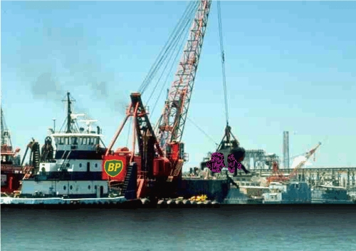 Oprah Winfrey is lowered onto the broken oil pipe.