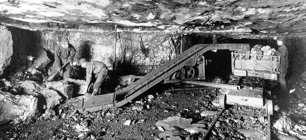 Photo of two men in a coal mine